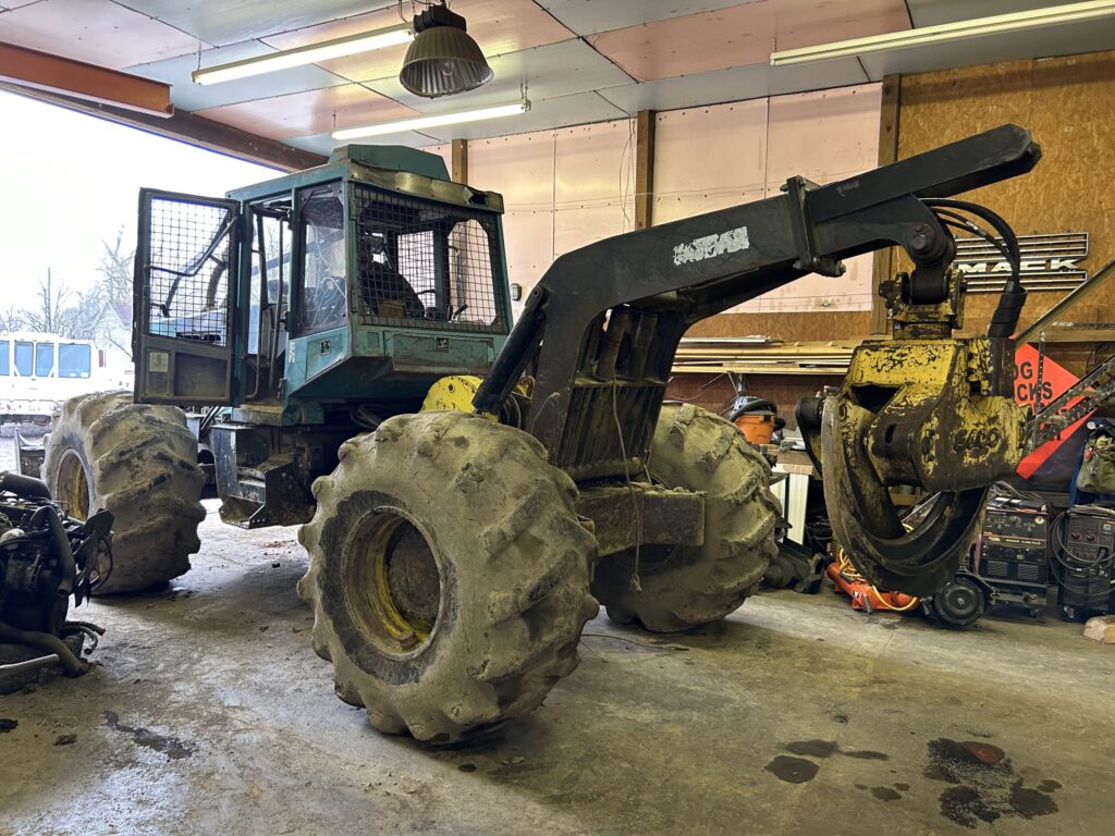 skidder parked in garage