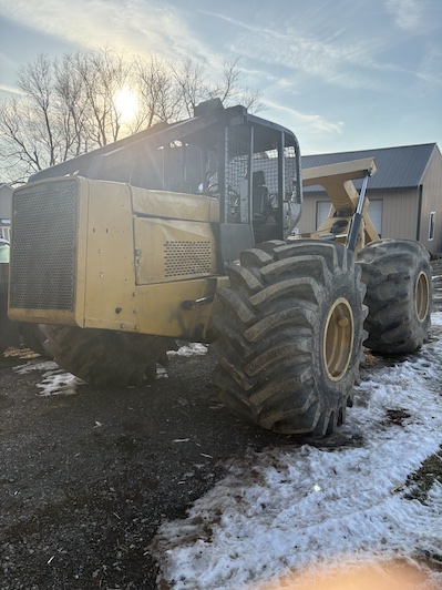 John Deere 640D grapple skidder